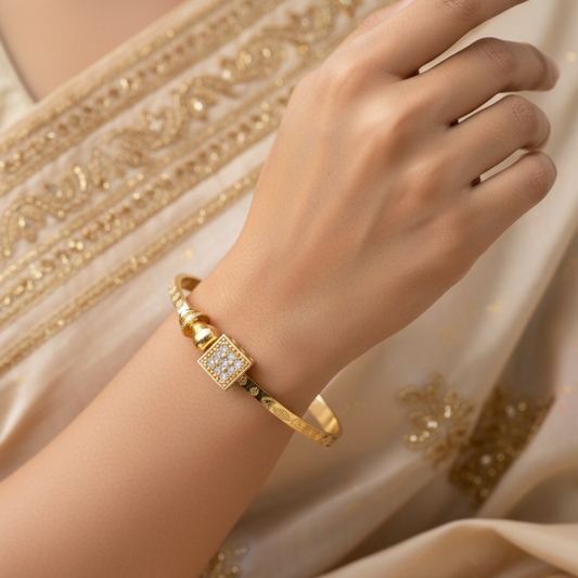 Elegant Gold Bangle Bracelet for Women – Stylish Stone-Studded Design