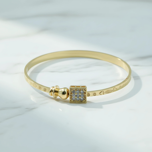 Elegant Gold Bangle Bracelet for Women – Stylish Stone-Studded Design