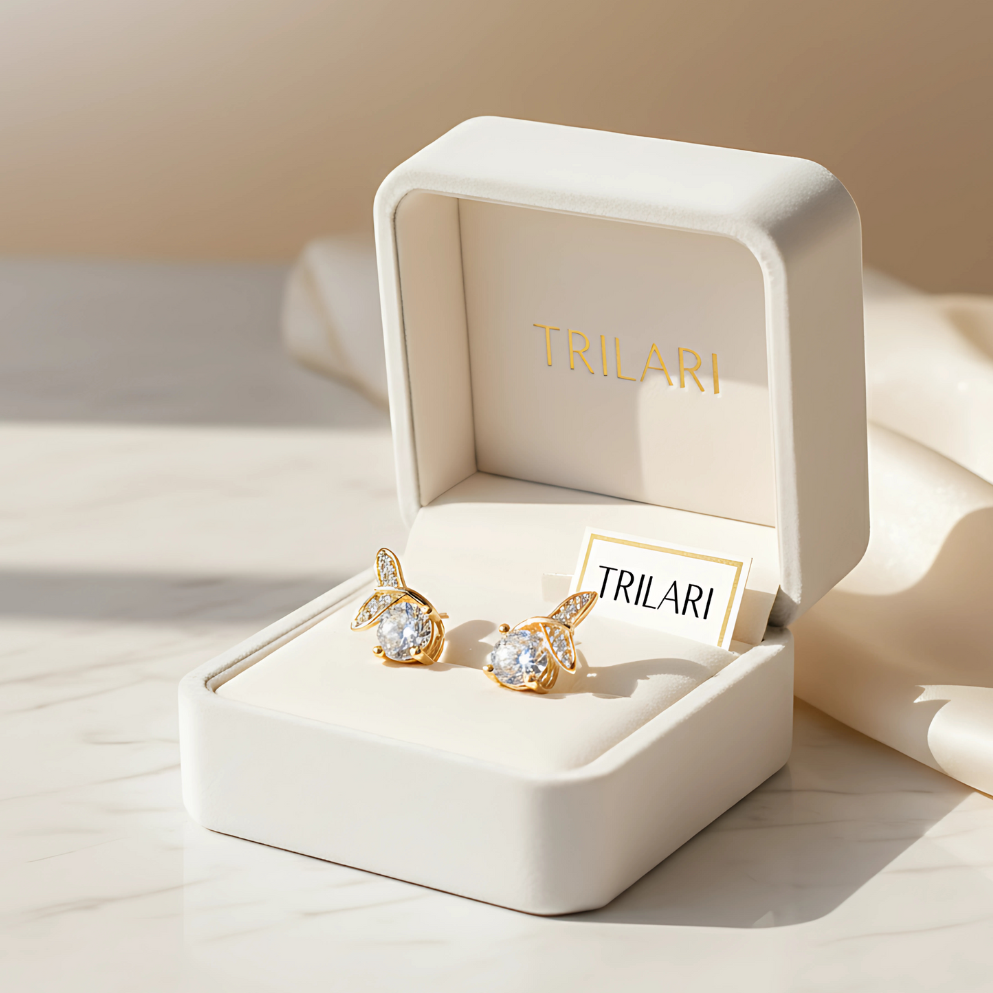 Gold-Plated Leaf Design Stud Earrings with CZ Stones