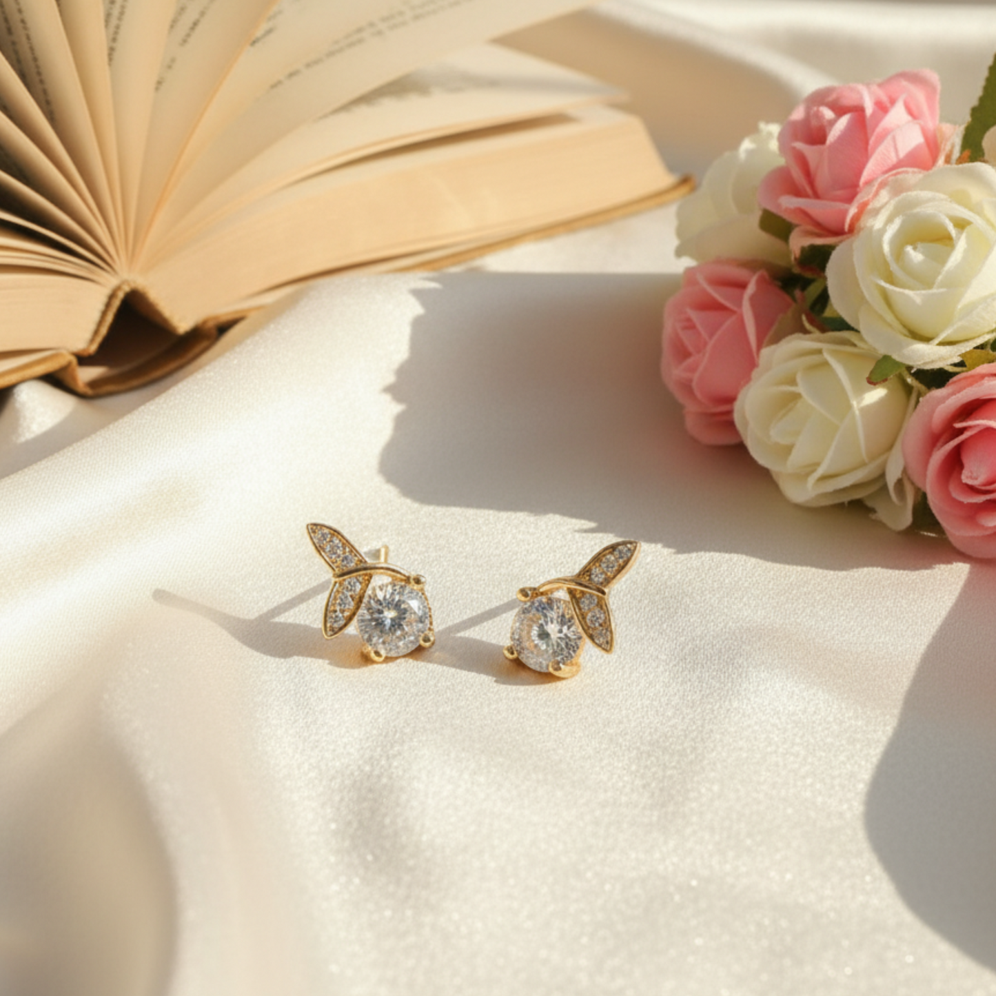 Gold-Plated Leaf Design Stud Earrings with CZ Stones
