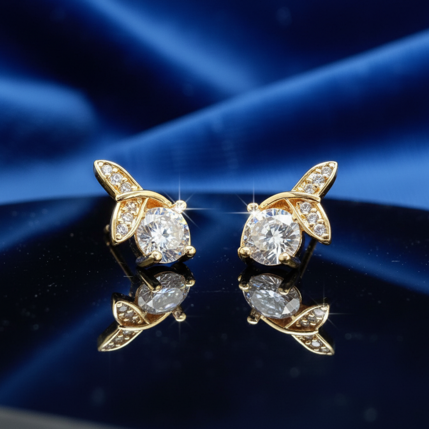 Gold-Plated Leaf Design Stud Earrings with CZ Stones