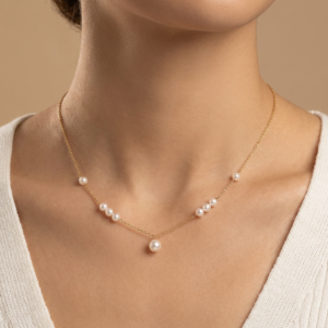 delicate gold pearl pendant necklace